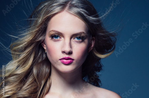 Beautiful blonde woman with pink lipstick beauty model