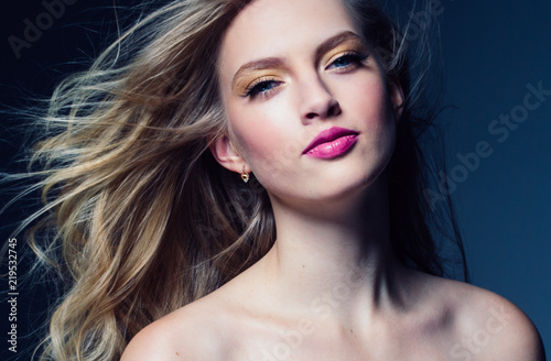 Beautiful blonde woman with pink lipstick beauty model