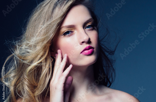 Beautiful blonde woman with pink lipstick beauty model