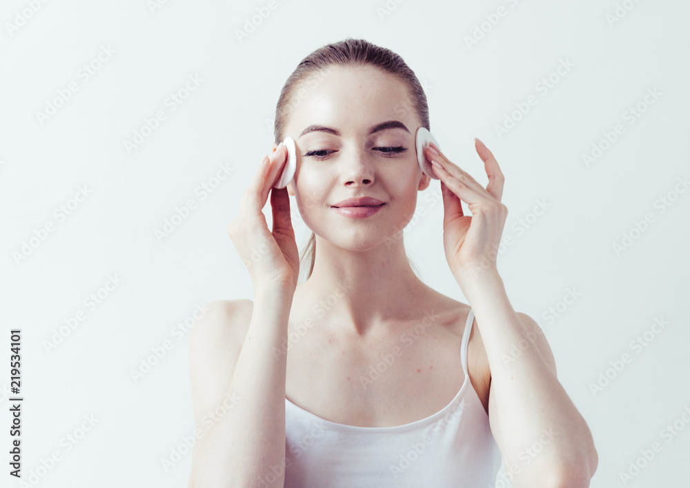 Woman makeup remove with cotton pad beauty healthy skin clean face Woman makeup remove with cotton pad beauty healthy skin clean face