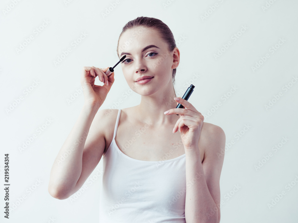 Woman applying mascara, beauty eyes lashes girl makeup Woman applying mascara, beauty eyes lashes girl makeup