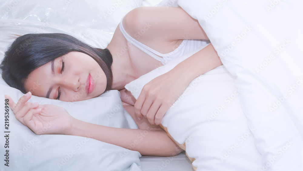 Asian young beautiful woman sleeping in her bed. She looking charming. Asian young beautiful woman sleeping in her bed. She looking charming.