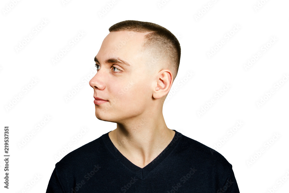 Portrait of young guy with caesar cut, isolated on white background. Side view. Portrait of young guy with caesar cut, isolated on white background. Side view.