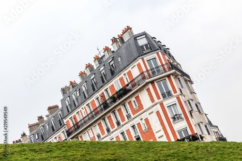 The sinking house illusion in Montmartre hill, Paris, France