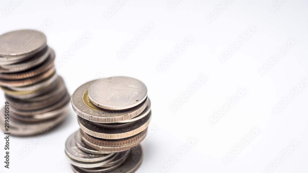 Coin thai bath stacking up selective focus on white background Coin thai bath stacking up selective focus on white background