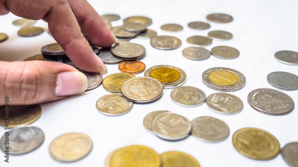 Fototapeta premium Close up hand and coin thai bath on white background