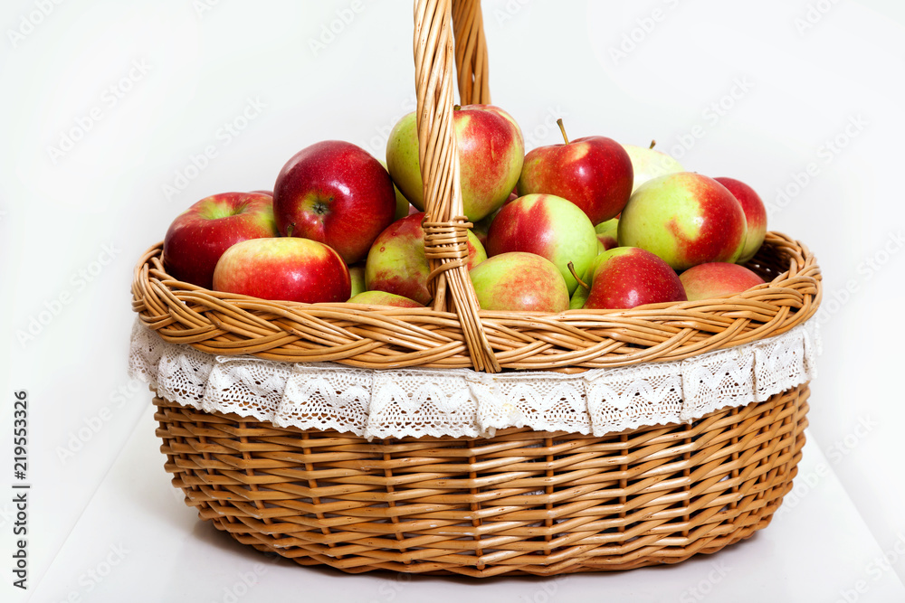 red white green apple purse basket background wood table wicker wattled braided lace