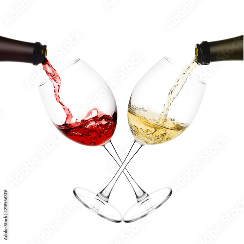 red and white wine poured from a bottle into wine glass on white background, isolated