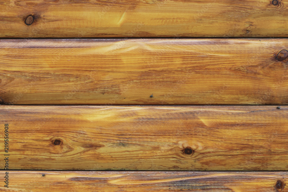 Naklejka premium Wooden background textured pattern in brown colors