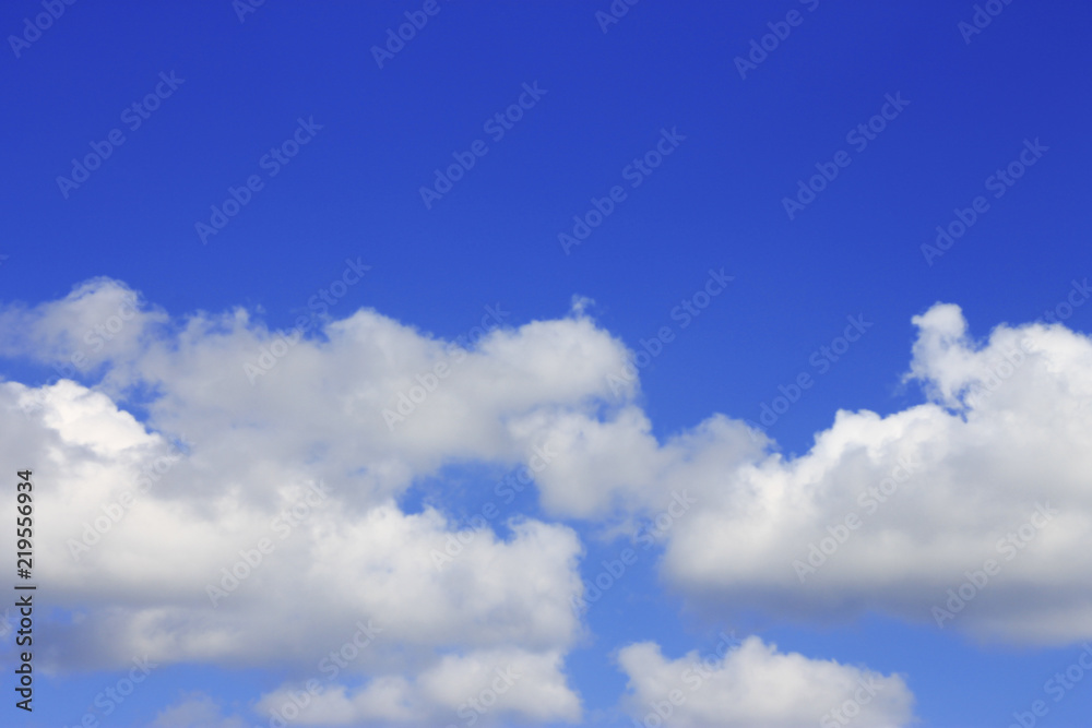 Idyllic white cloud on blue sky. Cloudscape background with fluffy cloud on blue summer sky wallpaper texture