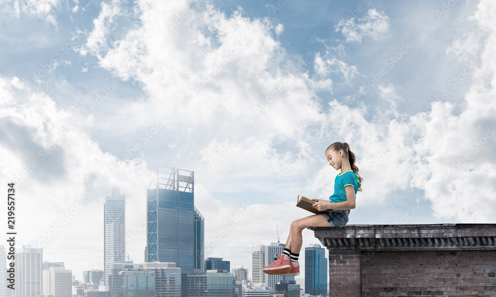 Concept of careless happy childhood with girl exploring this world Concept of careless happy childhood with girl exploring this world