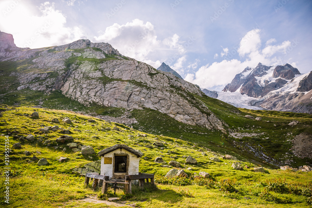 Christian Oratory in Green Mountain Landscape with Mont-Blanc Glacier.
