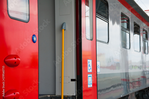 Red train in modern railway