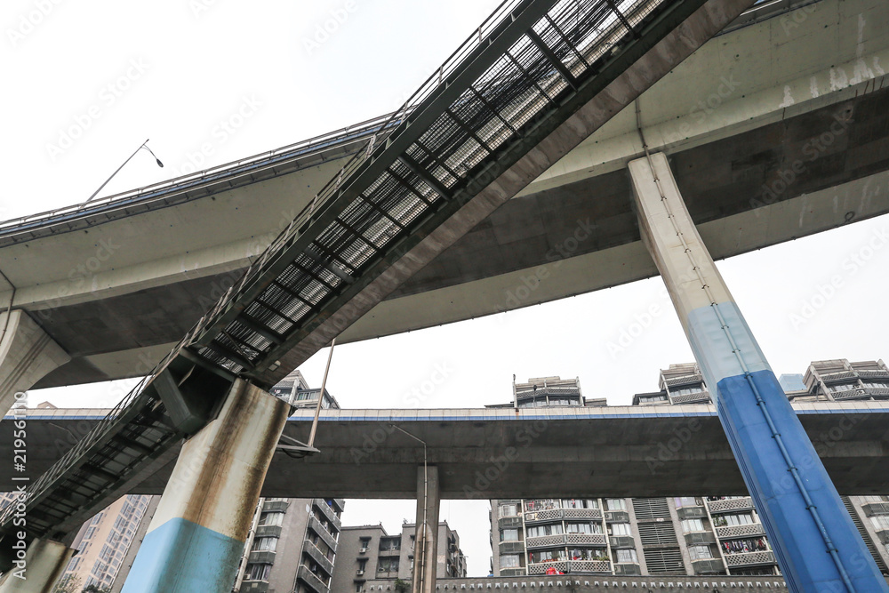 Overpassing overpass train tracks in the city, in Chongqing, China Overpassing overpass train tracks in the city, in Chongqing, China