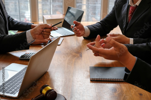 lawyer give advice to business people. businessman discussing legal legislation at law firm. judge gavel & team meeting at courtroom