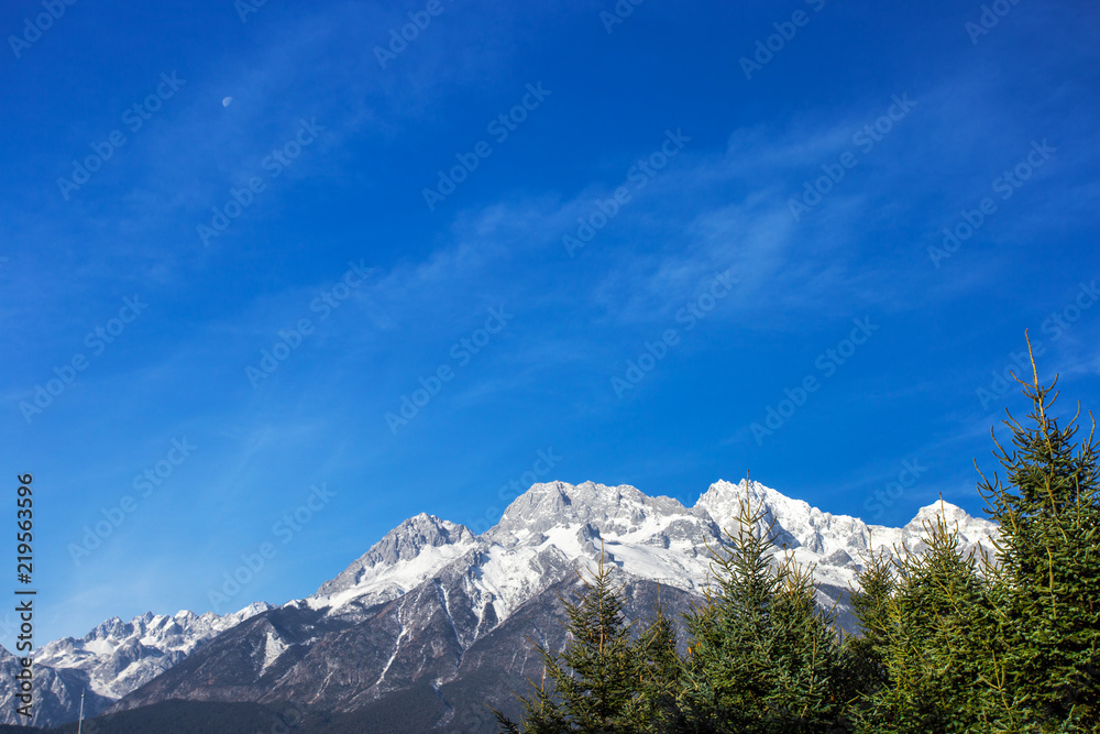Looking from the distance to the top of Jade Dragon Snow Mountain, Lijiang, Yunnan, China
