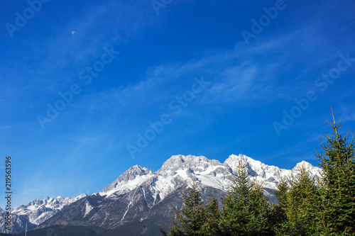 Looking from the distance to the top of Jade Dragon Snow Mountain, Lijiang, Yunnan, China