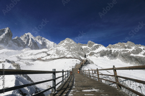 A wooden walkway has been extended to the top of Yulong Snow Mountain, in Lijiang, Yunnan, China.