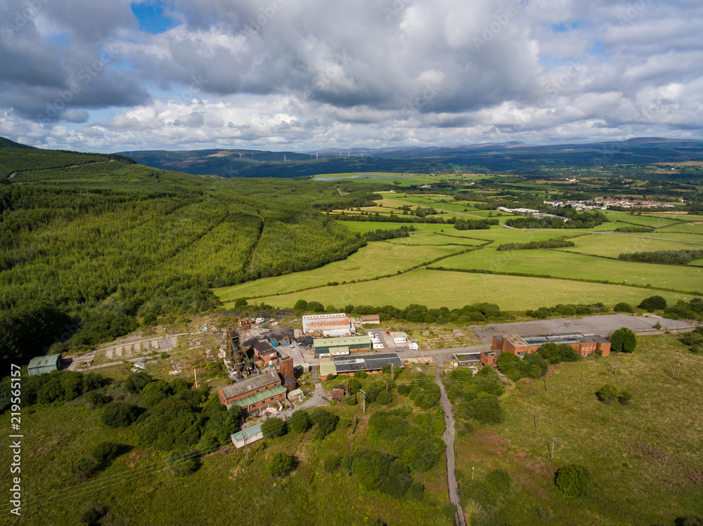 Aerial drone view of a closed, abandoned coal mine (Tower Colliery, South Wales)