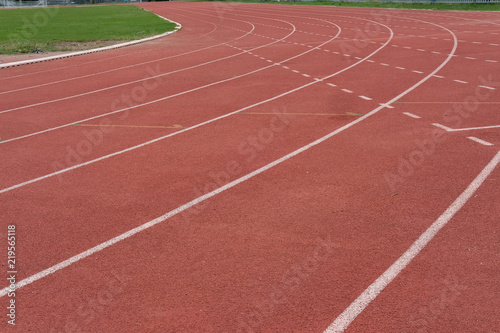 lane number & running racetrack, backstretch in outdoor sports stadium arena