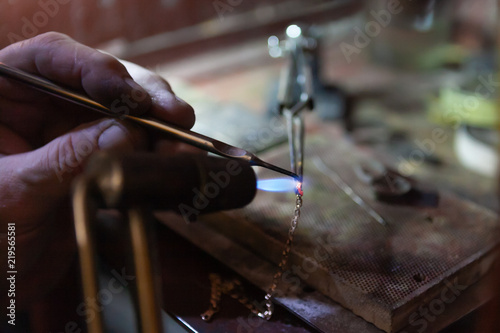 Work of the master, jeweler. Jewelry repair shop. Manufacturing of jewelry.