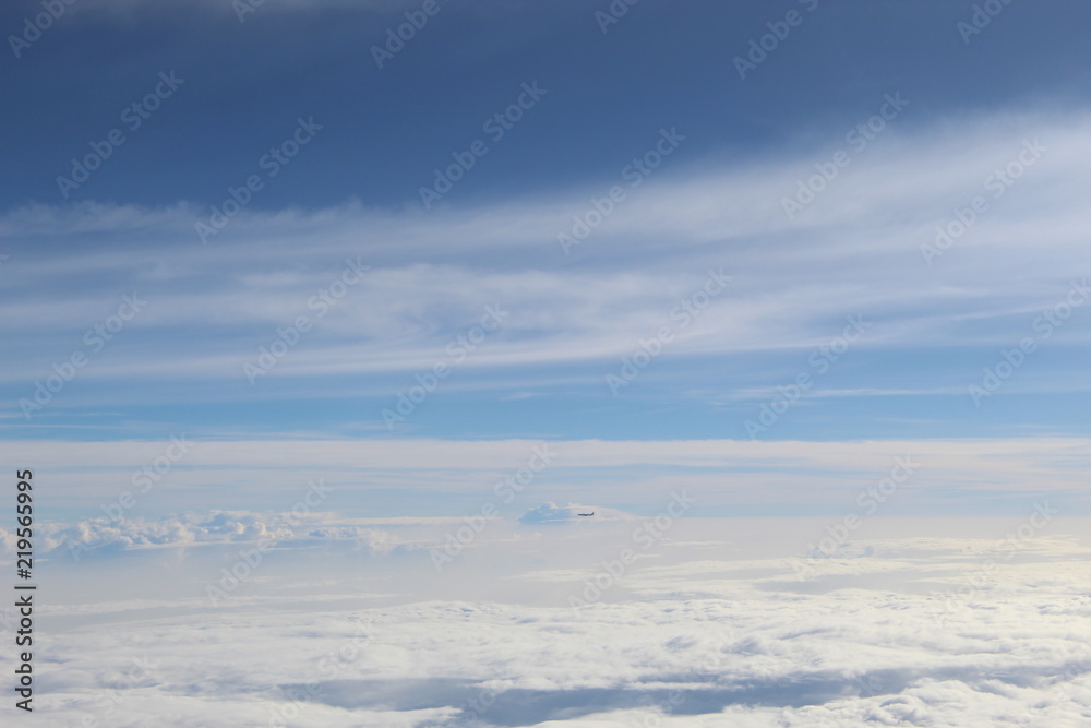Tiny distant plane seen from another plane Tiny distant plane seen from another plane