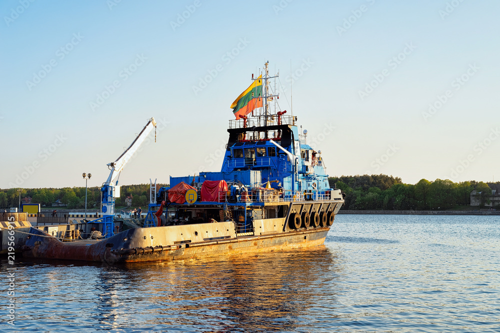 Dry cargo carrier at Port of Klaipeda in Lithuania Dry cargo carrier at Port of Klaipeda in Lithuania