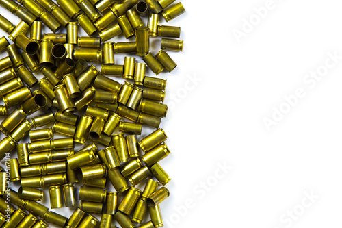 Bullets and shells pistol handgun background on white background photo