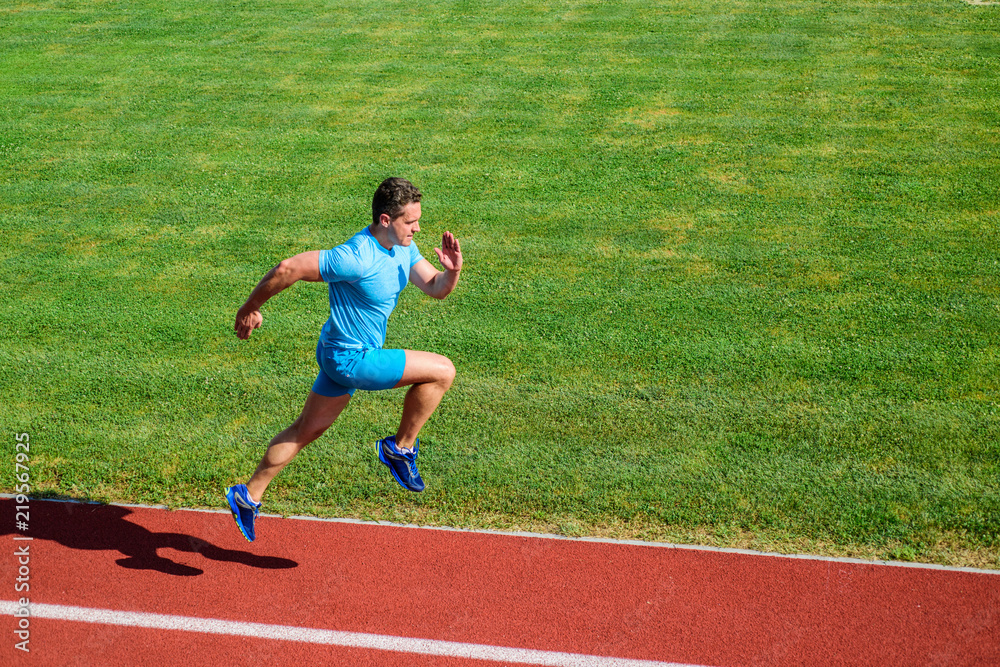 Runner focused on result. Short distance running challenge. Boost speed.  Athlete run track grass background. Run into shape. Sprinter training at  stadium track. Running challenge for beginners Stock Photo | Adobe Stock