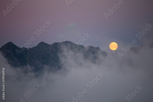 Fototapeta Naklejka Na Ścianę i Meble -  Moon over the mountains, Tatry, Poland