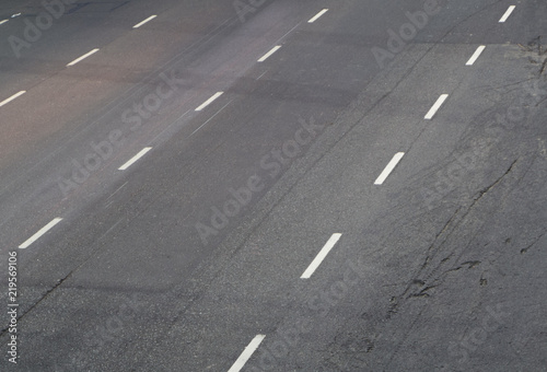 An empty four-lane avenue.