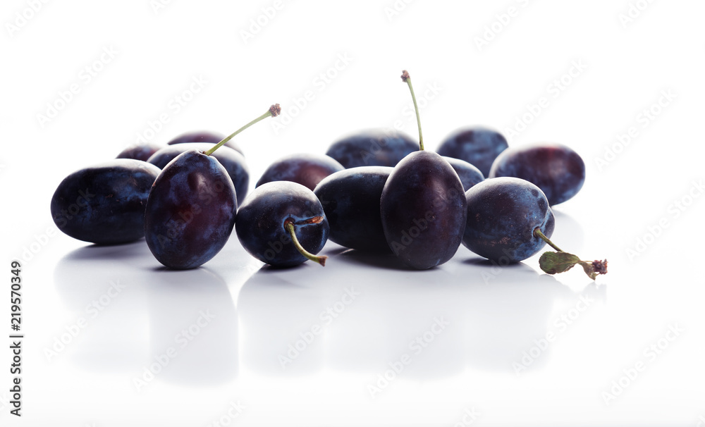 plums isolated on the white background plums isolated on the white background