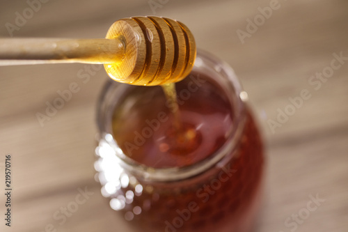 honey and wooden spoon