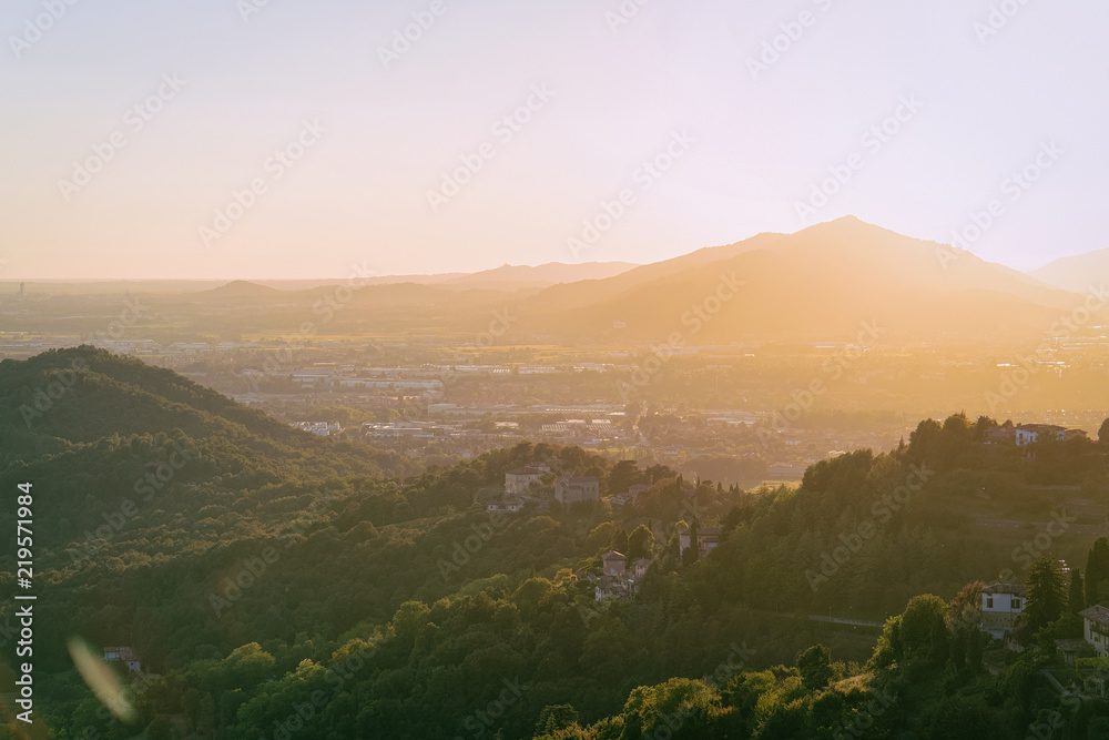 Scenery of Bergamo hills and Lower City of Bergamo sunset