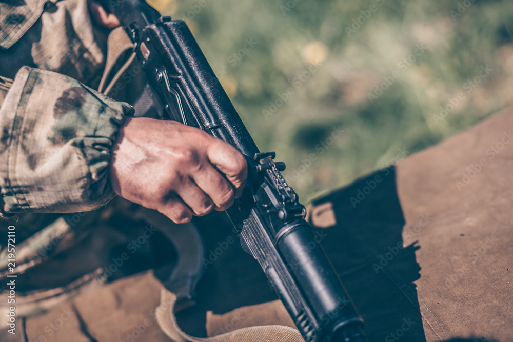 The instructor shows how to disassemble the AK47 Kalashnikov Stock Photo Adobe Stock