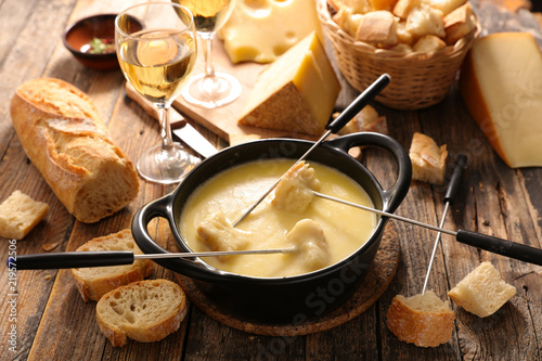 cheese fondue and bread photo