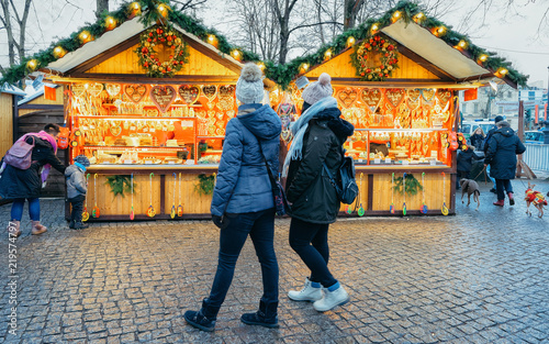 Girls on Night Christmas Market at Charlottenburg Palace in Winter
