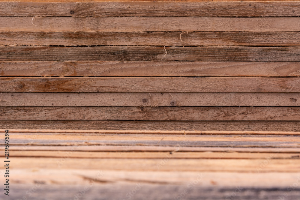 Obraz premium Wooden pine background from a close-up of wet boards, selective focus