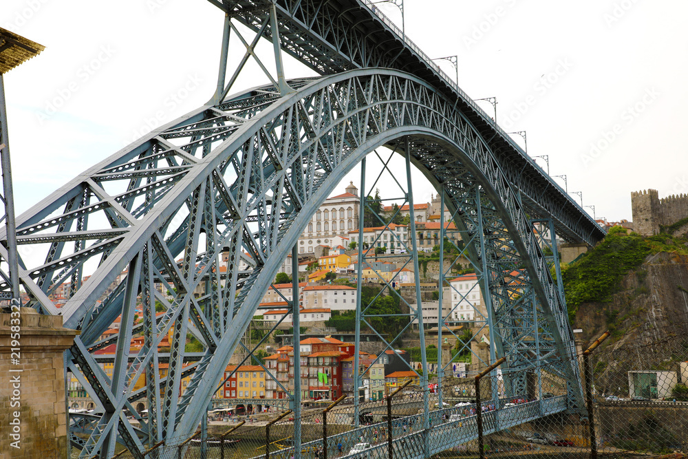 View of the historic famous bridge Dom Luiz I of Porto, Portugal. Low Angle.