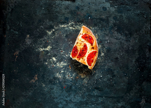 little piece Homemade pizza Margarita on vintage rusty metal background, balanced food concept,copy space, closeup,isolated.Flat lay.