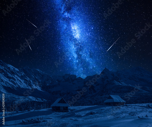 Fototapeta Naklejka Na Ścianę i Meble -  Falling stars and Tatras Mountains in winter at night