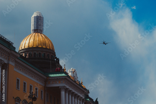 Military aircraft in the sky over St. Petersburg photo