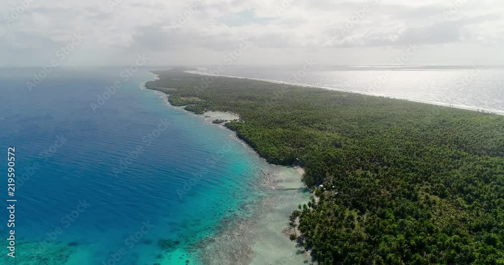 small islands (motu) in the middle of a lagoon in aerial view, French Polynesia small islands (motu) in the middle of a lagoon in aerial view, French Polynesia