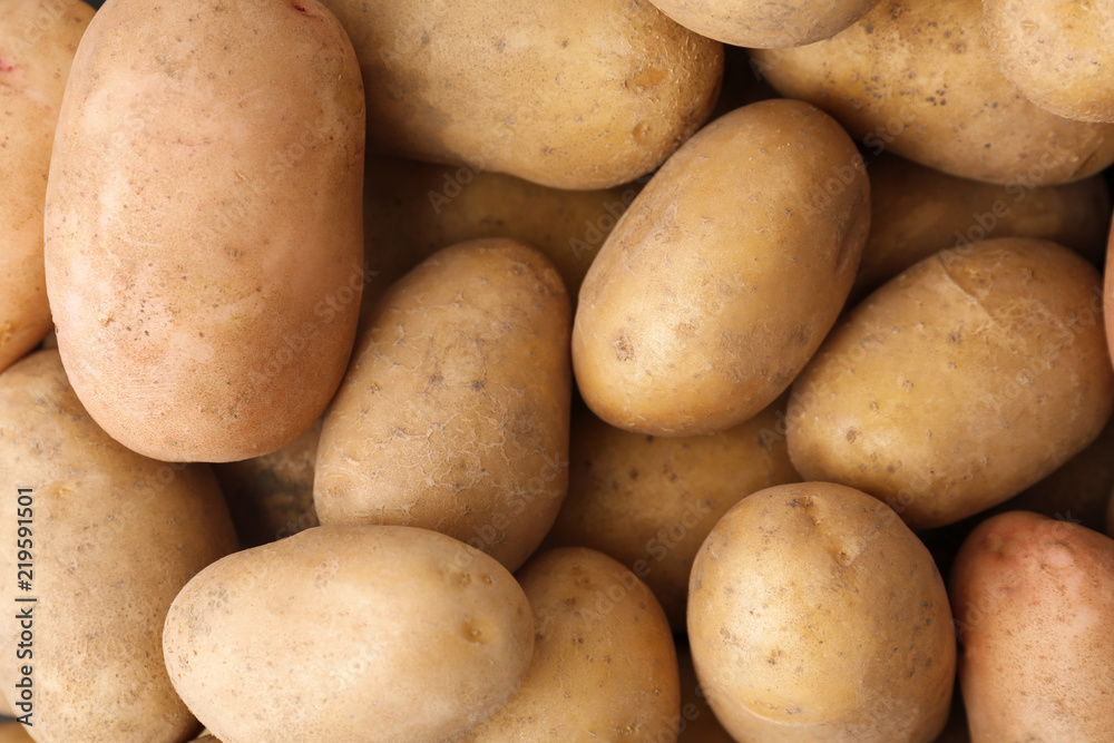 Fresh ripe organic potatoes as background, top view Fresh ripe organic potatoes as background, top view