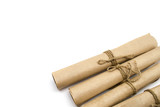Rolls of paper tied with a rope isolated on white background.