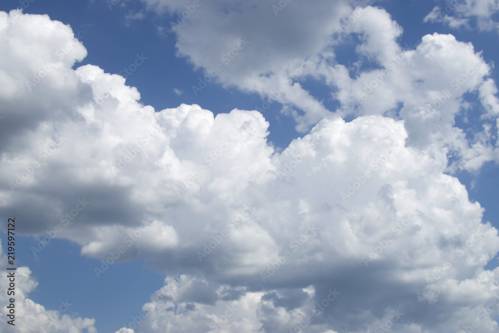 white clouds stretch all over the blue sky white clouds stretch all over the blue sky