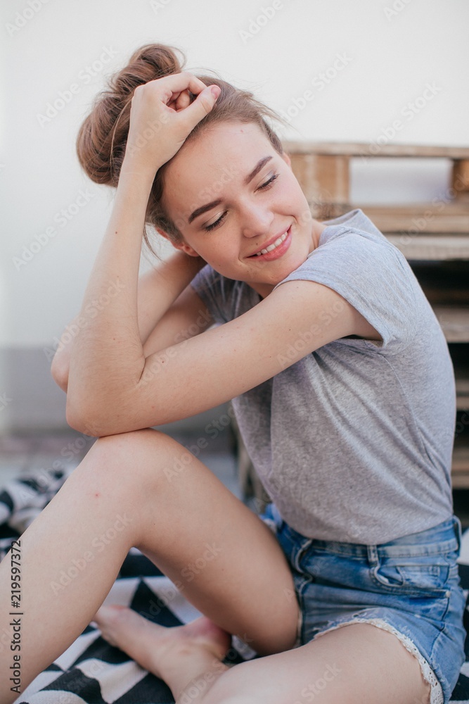 Portrait of beautiful young brunette woman with makeup