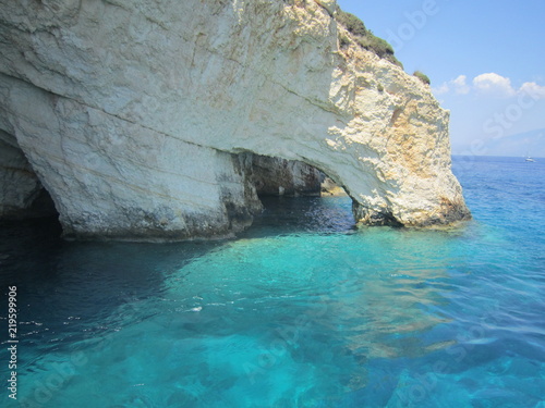 blue sea cliff cave
