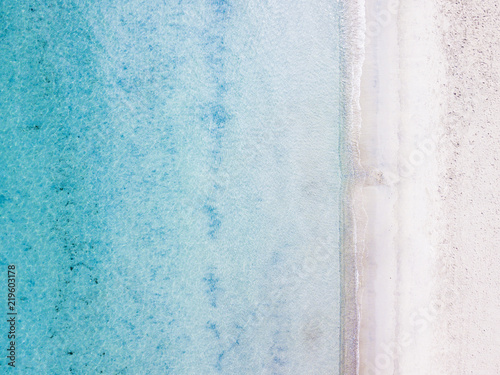 Aerial view of an amazing white beach with beautiful turquoise sea. Cala Brandinchi  Sardinia  Italy.