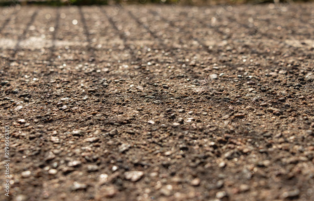 background. defocus. asphalt covering of a sports ground background. defocus. asphalt covering of a sports ground